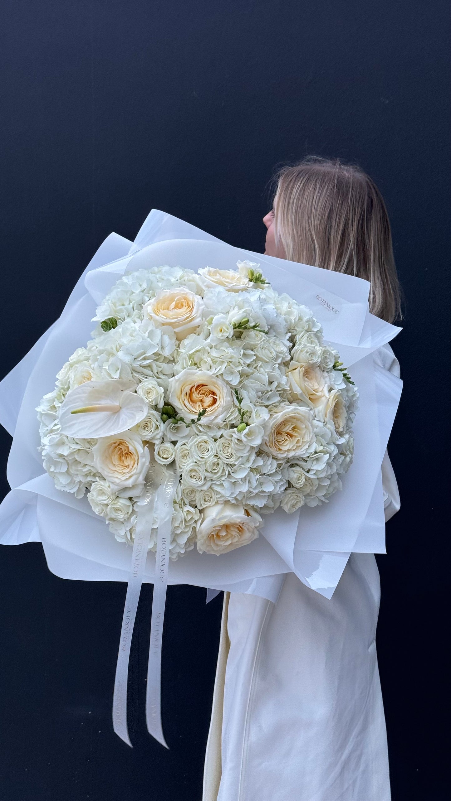 Mixed white Bouquet with roses, spray roses and Anthurium