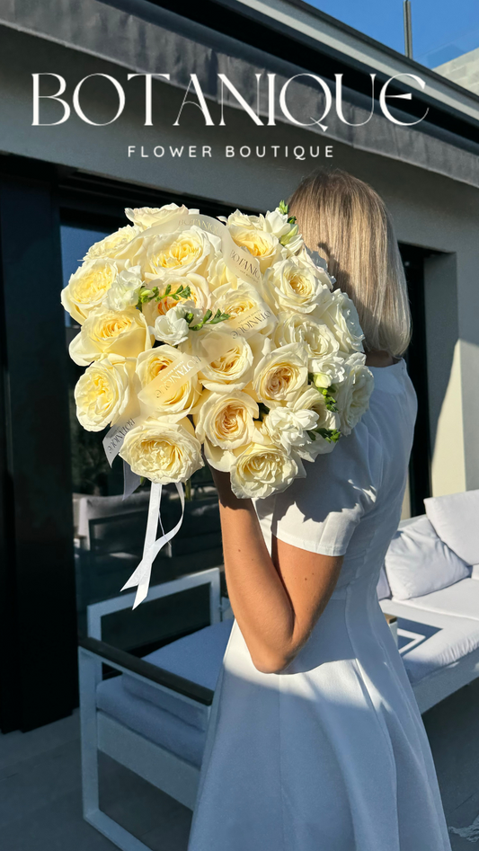 Bouquet of white roses and freesia